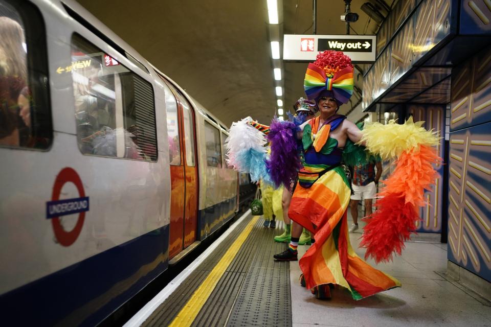 People at Leicester Square underground station as they head to Hyde Park to take part in the Pride in London parade (PA)
