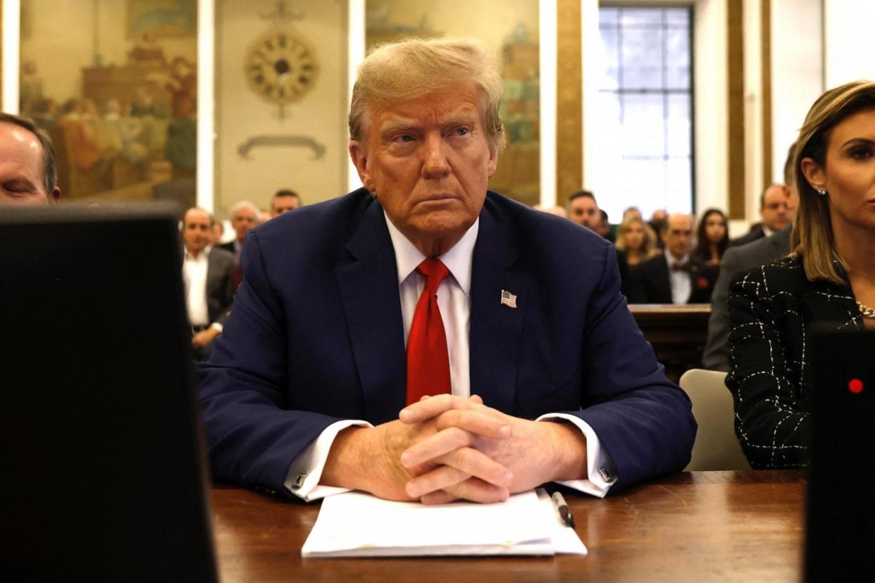 PHOTO: Former President Donald Trump sits in New York State Supreme Court during the civil fraud trial against the Trump Organization, in New York, Jan. 11, 2024.  (Peter Foley/Pool/AFP via Getty Images)