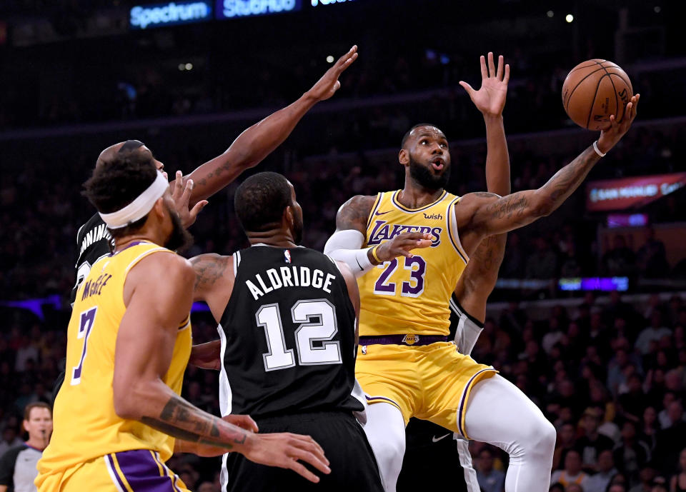 LeBron James drilled his first huge shot as a member of the Lakers on Monday night, sending the Lakers into overtime against the Spurs with a last-second 3-point bucket. (Getty Images)