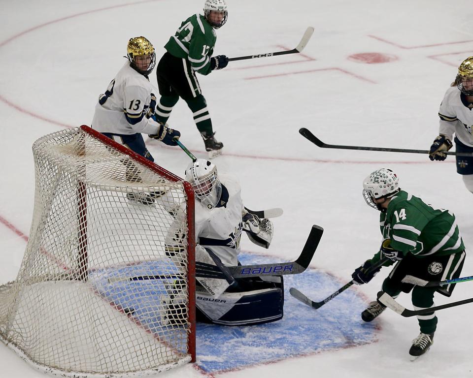 Archbishop Williams goalie Evelyn Lacey looks behind her after Canton’s Audrey Koen’s shot slipped past her for the winning goal during third period action of their game in the Division 2 state semifinal at Gallo Ice Arena in Bourne on Saturday, March 11, 2023.