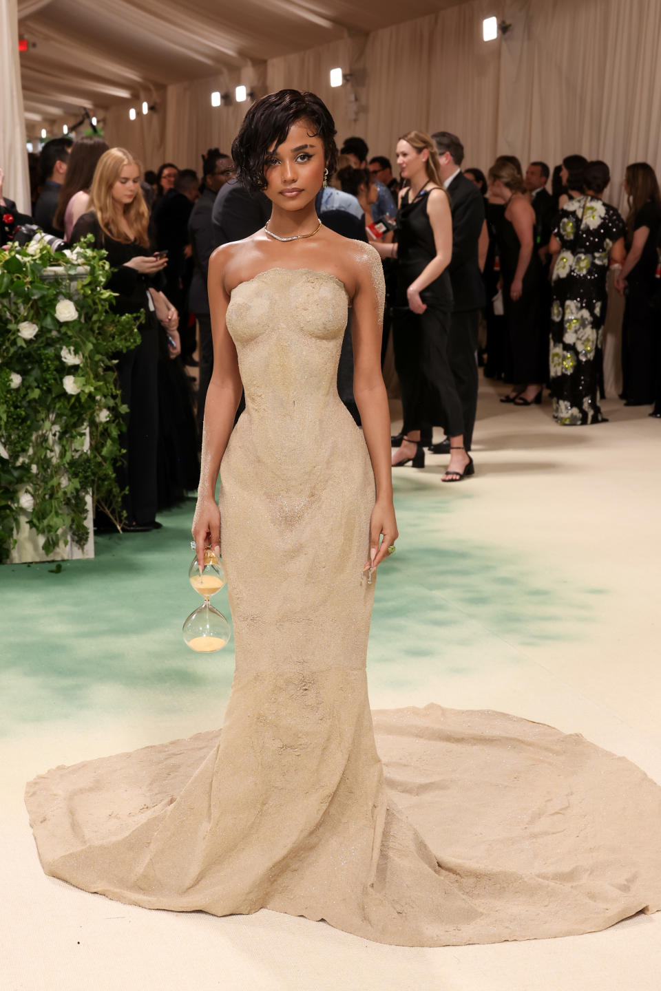 Tyla at the Met Gala in a floor-length gown that is form-fitting