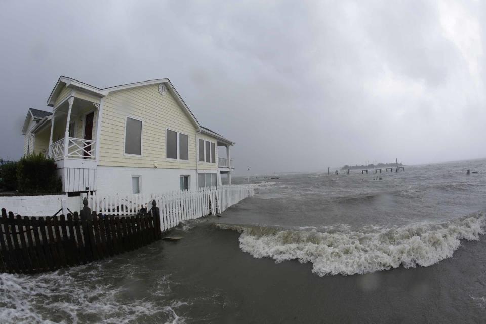 High winds and water surround a house as Hurricane Florence hits Swansboro, North Carolina on Friday.