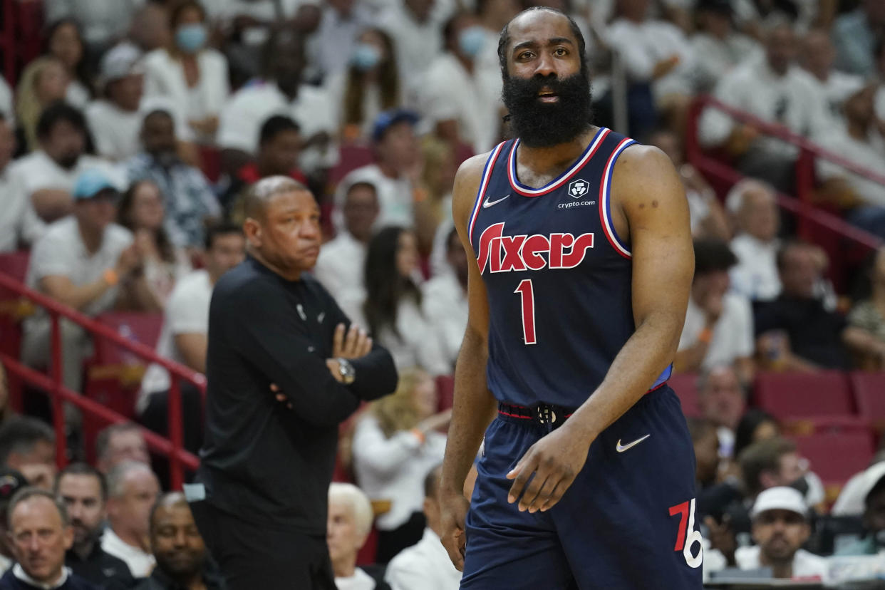 76ers guard James Harden and coach Doc Rivers need to figure out some solutions before they fall too far behind the Heat in their playoff series. (AP Photo/Marta Lavandier)
