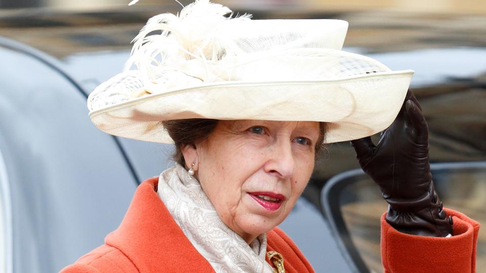 Princess Anne wears an orange coat