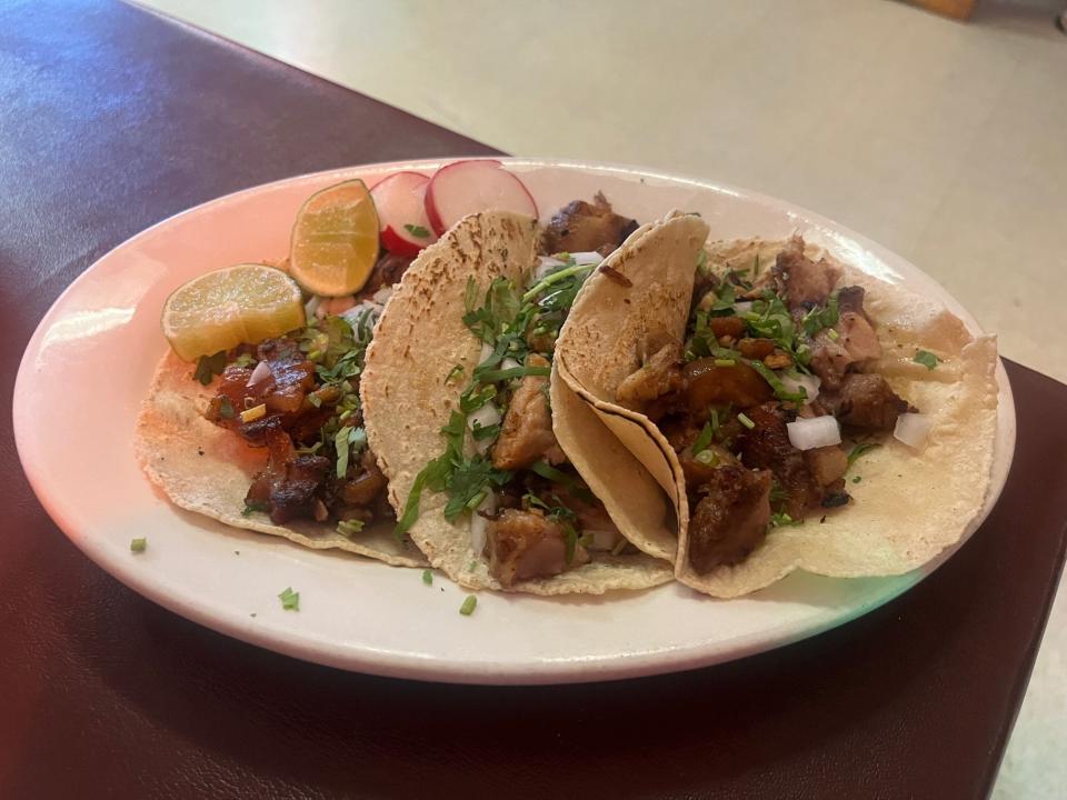 The carnitas tacos at Tacos Los Compadres in Newark are made with pork shoulder and skin, and come with housemade tortillas.