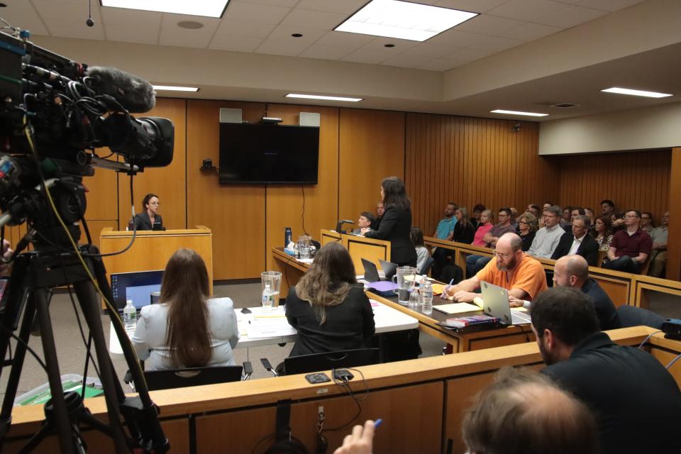Dale Warner's lead attorney, Mary Chartier, questions Michigan State Police analyst Georgia Ziegler Friday in Lenawee County District Court. This was the third day of a preliminary interaction into the murder and evidence tampering charges against Warner in the disappearance of his wife, Dee.