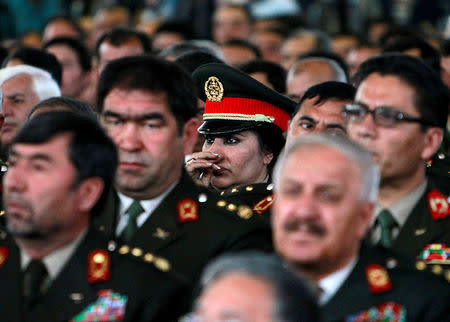Afghan army generals attend during a gathering of army and police officers at the National Military Academy in Kabul, Afghanistan March 22, 2011. REUTERS/Omar Sobhani/Files