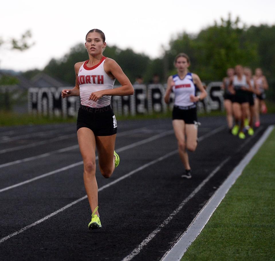 North Hagerstown's Lauren Stine leads the girls 3,200-meter run on her way to victory at the Class 3A West region meet at Oakdale.