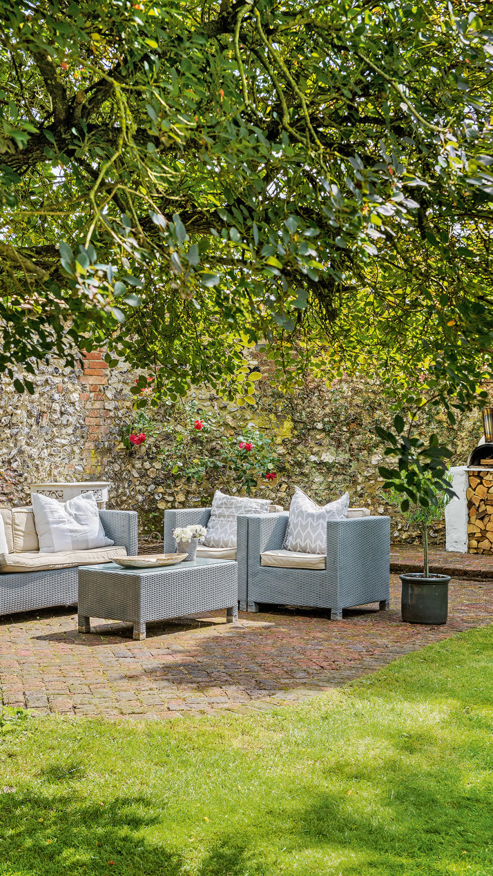<p> Robust, traditional materials like timber, stone and brick lend themselves to a more rustic style garden. A pretty pastel outdoor sofa and chairs can set the scene and a climbing rose is classic cottage garden essential. Choose a fragrant climber and train it up a wall for quintessential country garden look.  </p>