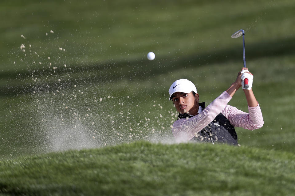 Megha Ganne hits from the bunker on the 18th green during the first round of the U.S. Women's Open golf tournament at The Olympic Club, Thursday, June 3, 2021, in San Francisco. (AP Photo/Jed Jacobsohn)