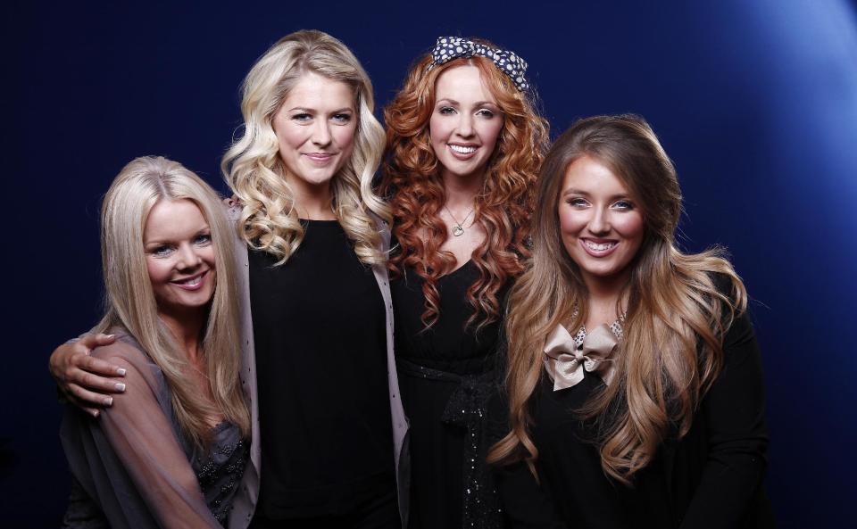 Members of the Irish folk group Celtic Woman, from left, Máiréad Nesbitt, Susan McFadden, Lisa Lambe and Chloë Agnew pose for a portrait in New York on Thursday, March 15, 2012. Celtic Woman, an all-female musical ensemble, will be performing at Oakdale Theatre in Wallingford, Conn., on St. Patrick's Day. (AP Photo/Carlo Allegri)