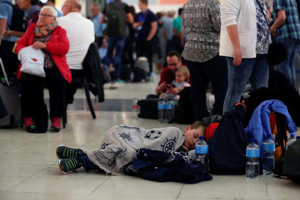 Stranded passengers wait at Las Palmas Airport in Gran Canaria (REUTERS)