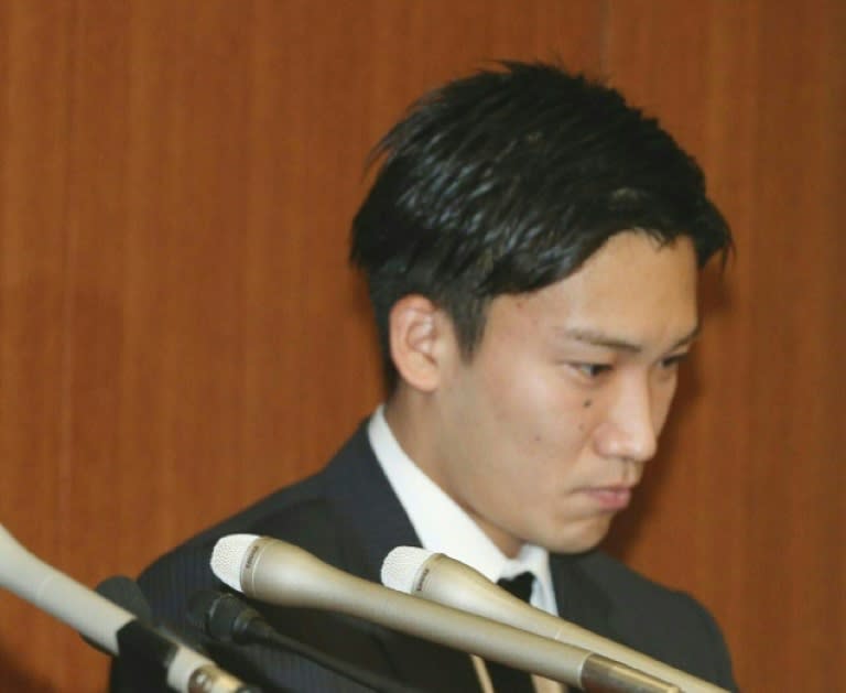 Japanese badminton player Kento Momota during a press conference in Tokyo on April 8, 2016