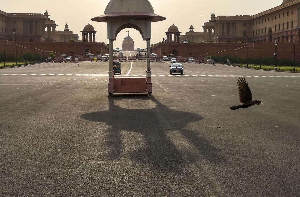 Vijay Chowk wears a deserted look during COVID-induced lockdown, as coronavirus cases surge in New Delhi, Tuesday, 20 April 2021.
