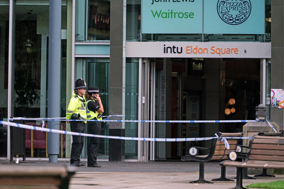 Police officers outside a branch of Greggs near Old Eldon Square, Newcastle, where a 52-year-old man was assaulted on Wednesday and later died in hospital.