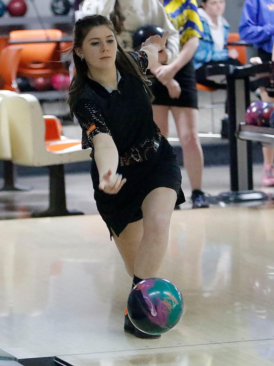 Ashland High School's Aubrie Cooke bowls against Wooster High School during their bowling match Tuesday, Nov. 30, 2021 at Luray Lanes. TOM E. PUSKAR/TIMES-GAZETTE.COM