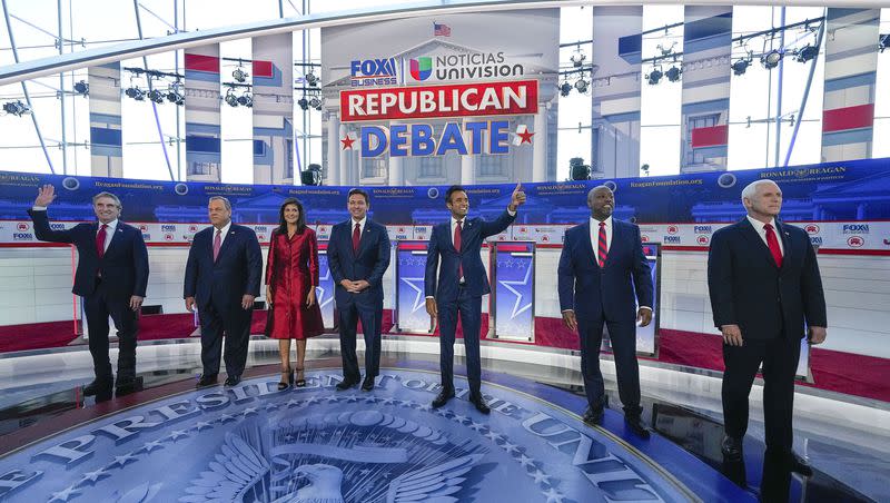 Republican presidential candidates, from left, North Dakota Gov. Doug Burgum, former New Jersey Gov. Chris Christie, former U.N. Ambassador Nikki Haley, Florida Gov. Ron DeSantis, entrepreneur Vivek Ramaswamy, Sen. Tim Scott, R-S.C., and former Vice President Mike Pence, before the start of a Republican presidential primary debate hosted by FOX Business Network and Univision, Wednesday, Sept. 27, 2023, at the Ronald Reagan Presidential Library in Simi Valley, Calif.