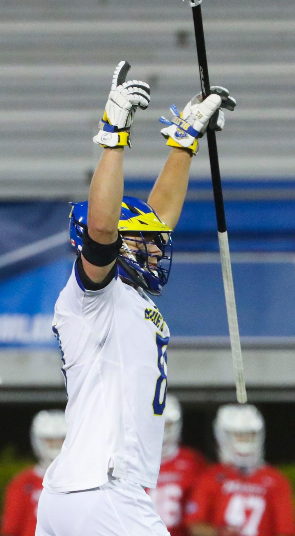 Delaware's Owen Grant reacts after assisting on a score during the second half of Delaware's 25-10 win against Marist in the opening round of the NCAA Division I lacrosse championship at Delaware Stadium, Wednesday, May 10, 2023.