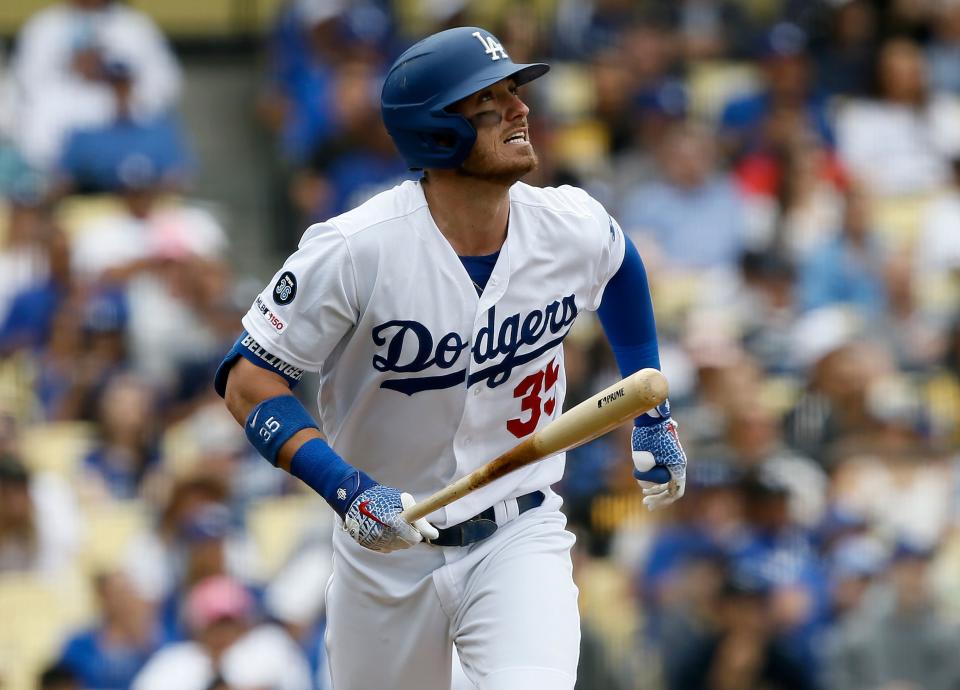 Los Angeles Dodgers' Cody Bellinger watches his solo home run against the Pittsburgh Pirates during the fourth inning of a baseball game in Los Angeles, Sunday, April 28, 2019. (AP Photo/Alex Gallardo)