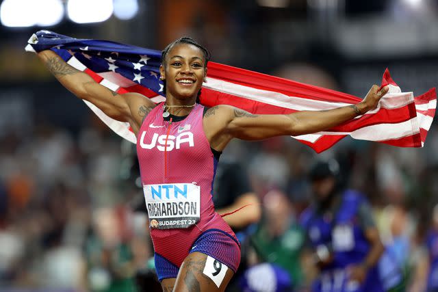 <p>Michael Steele/Getty</p> Sha'Carri Richardson of Team United States celebrates winning the Women's 100m Final during day three of the World Athletics Championships Budapest 2023