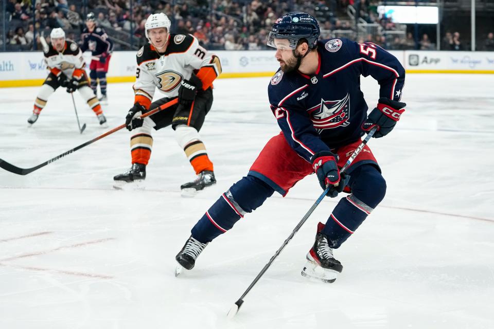 Oct 24, 2023; Columbus, Ohio, USA; dColumbus Blue Jackets right wing Emil Bemstrom (52) skates ahead of Anaheim Ducks right wing Jakob Silfverberg (33) uring the third period of the NHL game at Nationwide Arena. The Blue Jackets lost 3-2 (OT).