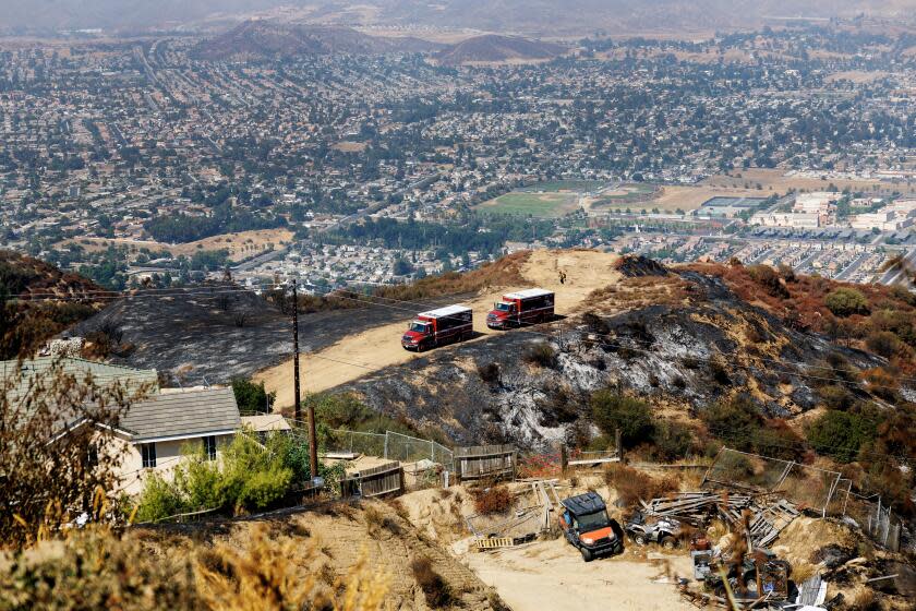 LAKE ELSINORE, CA - SEPTEMBER 12, 2024: The community of Lake Elsinore below Ortega Highway was saved from the Airport fire on September 12, 2024 in Lake Elsinore, California. (Gina Ferazzi / Los Angeles Times)