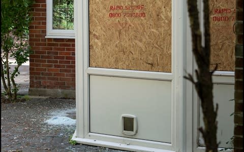 A boarded up window at the luxury property which large groups of revelers had been renting for raucous pre-wedding celebrations - Credit: BNPS&nbsp;/BNPS&nbsp;