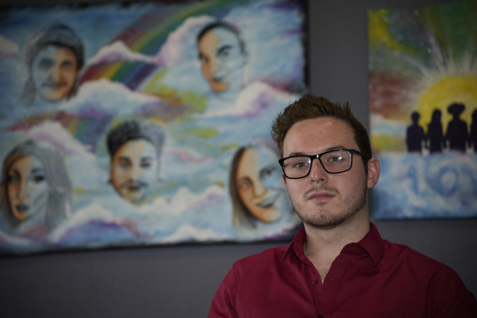 Michael Anderson of Club Q sits for a portrait on Monday, June 5, 2023, in Colorado Springs, Colo. “No one has sympathy for [Anderson Lee Aldrich],” said Anderson, who was bartending at Club Q when the shooting broke out and ducked as several patrons were gunned down around him. “This community has to live with what happened, with collective trauma, with PTSD, trying to grieve the loss of our friends, to move past emotional wounds and move past what we heard, saw and smelled.” (AP Photo/David Zalubowski)