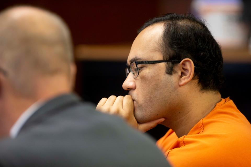 Hector Manley sits during his plea hearing, Friday, Jan. 21, 2022, at Collier County Courthouse.Manley was found guilty on 20 counts of lewd lascivious molestation of a child under 12.