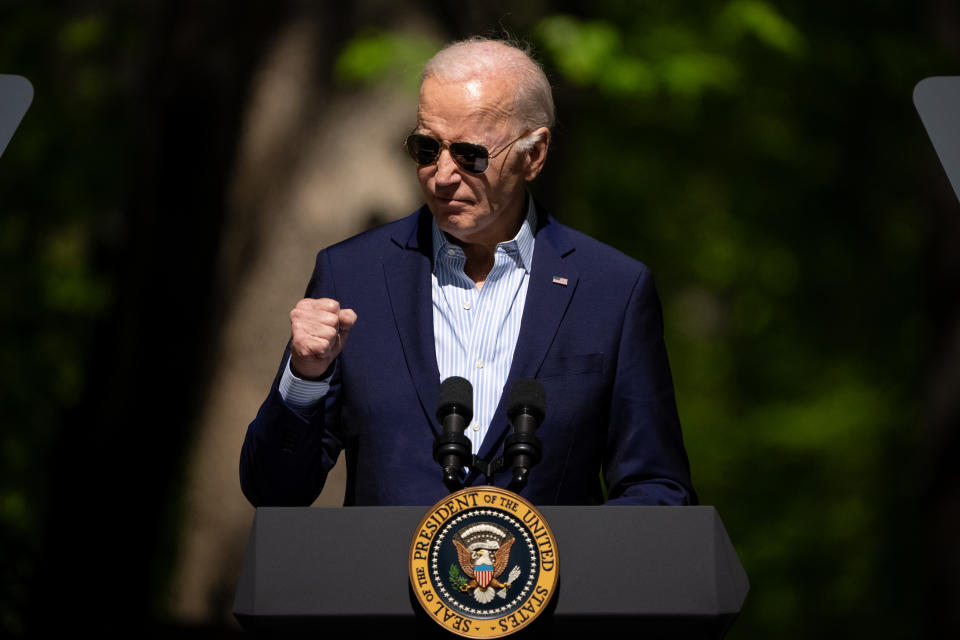 TRIANGLE, VIRGINIA - APRIL 22: U.S. President Joe Biden pumps his fist while speaking on Earth Day at Prince William Forest Park on April 22, 2024 in Triangle, Virginia. Biden, along with Sens. Bernie Sanders (D-VT), Edward Markey (D-MA), and Rep. Alexandria Ocasio-Cortez (D-NY), announced a seven billion dollar 