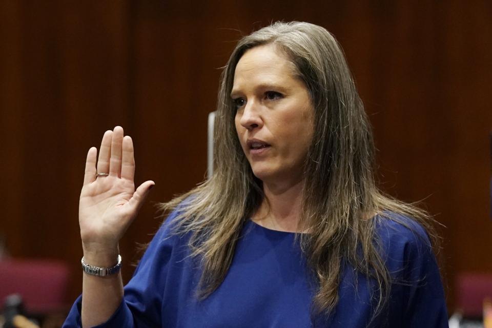 FILE - Rep. Shawnna Bolick, R-Phoenix, is sworn in during the opening of the Arizona Legislature at the state Capitol, Jan. 11, 2021, in Phoenix. Bolick, a Trump supporter who contends the 2020 election was deeply flawed, said in a televised debate that she would not have certified the election had she been secretary of state, despite it being a requirement to do so absent a court order. (AP Photo/Ross D. Franklin, Pool, File)