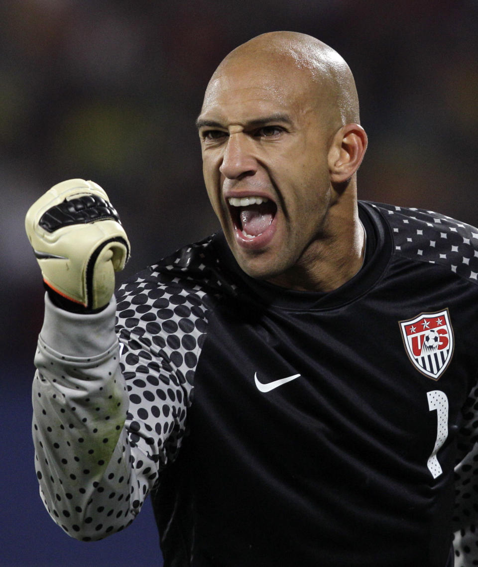 FILE - United States goalkeeper Tim Howard clenches his fist during the World Cup round of 16 soccer match between the United States and Ghana at Royal Bafokeng Stadium in Rustenburg, South Africa, June 26, 2010. Howard was elected to the U.S. National Soccer Hall of Fame on Saturday, Dec. 2, 2023, and will be inducted on May 4, 2024. (AP Photo/Elise Amendola, File)