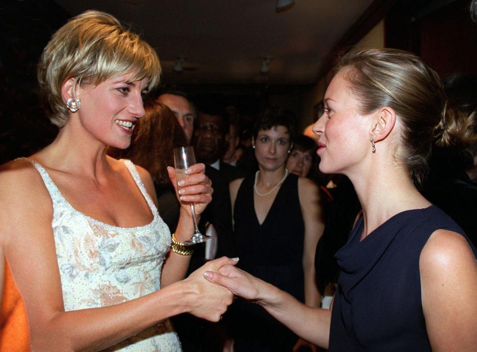 <p>The young supermodel met Princess Diana at the pre-auction party for the Princess's dress collection at Christie's in New York City. Moss wore a simple navy cowl neck dress, while Diana chose a beaded floral dress by Catherine Walker. </p>