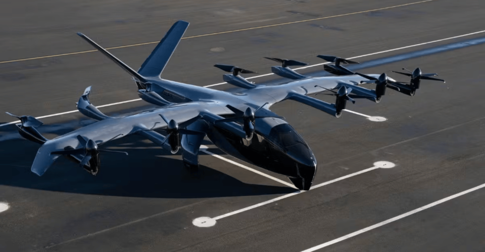 A Midnight EV is parked on a runway. 