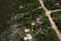 <p>Houses are seen in ruins in Codrington on the island of Barbuda just after a month after Hurricane Irma struck the Caribbean islands of Antigua and Barbuda, October 7, 2017. REUTERS/Shannon Stapleton </p>