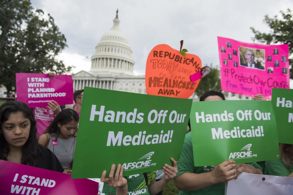 Supporters of Planned Parenthood protest the Senate Republicans’ health care bill outside the U.S. Capitol in Washington, D.C., Tuesday. (Photo: Saul Loeb/AFP/Getty Images)