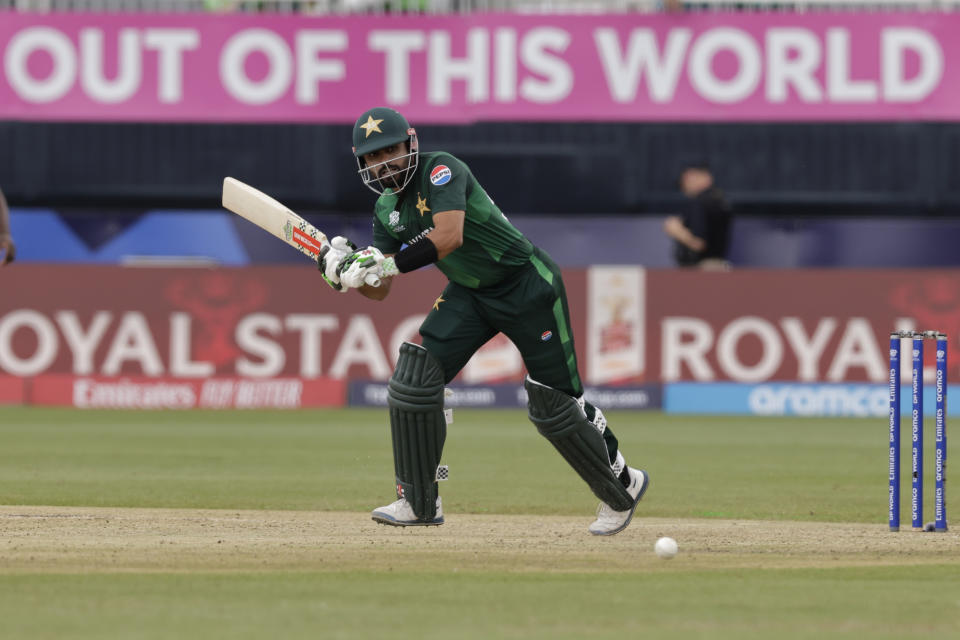 Pakistan's captain Babar Azam plays a shot during the ICC Men's T20 World Cup cricket match between Pakistan and Canada at the Nassau County International Cricket Stadium in Westbury, New York, Tuesday, June 11, 2024. (AP Photo/Adam Hunger)