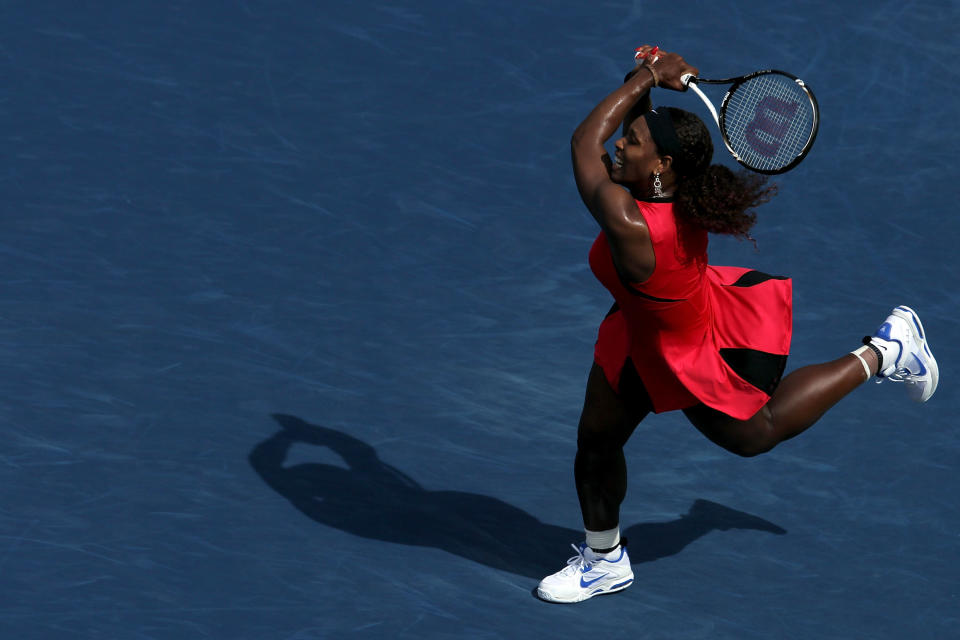 NEW YORK, NY - SEPTEMBER 08: Serena Williams of the United States returns a shot against Anastasia Pavlyuchenkova of Russia during Day Eleven of the 2011 US Open at the USTA Billie Jean King National Tennis Center on September 8, 2011 in the Flushing neighborhood of the Queens borough of New York City. (Photo by Nick Laham/Getty Images)