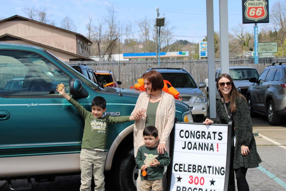 Joanna Bragg and her two sons with the Ford F-150 she purchased through Working Wheels