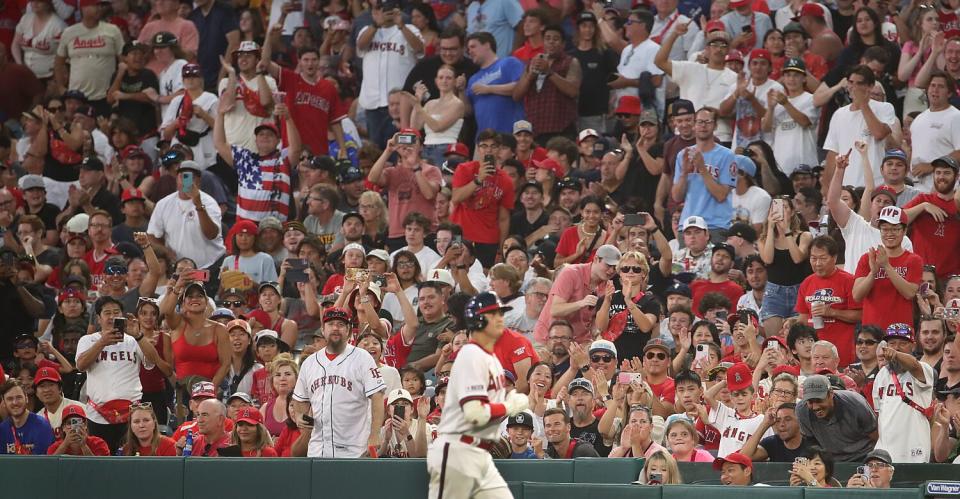Fans cheer as they get a close-up view of Angels two-star Shohei Ohtani