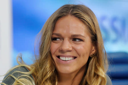 Russia's Olympic medalist Yulia Efimova, who won silver medals for Women's Swimming 100m and 200m Breaststroke, attends a news conference in Moscow, Russia August 24, 2016. REUTERS/Maxim Zmeyev