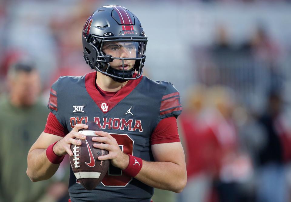 Oklahoma's Jackson Arnold (10) warms up before the college football game between the University of Oklahoma Sooners and the West Virginia Mountaineers at Gaylord Family-Oklahoma Memorial Stadium in Norman, Okla., Saturday, Nov., 11, 2023.