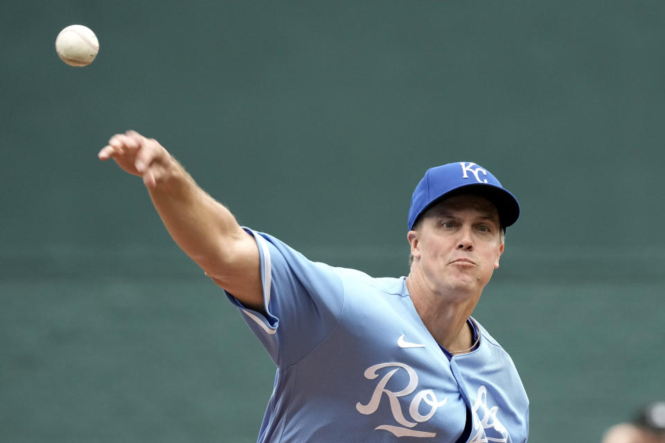 Kansas City Royals starting pitcher Zack Greinke throws during the first inning of an opening day baseball game against the Minnesota Twins in Kansas City, Mo., Thursday, March 30, 2023. (AP Photo/Charlie Riedel)