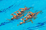 <p>Team Singapore performs during the synchronised swimming team free event on 20 Aug. Singapore won gold in the event, Malaysia took the silver and Indonesia bronze. Photo: Stanley Cheah/SportSG </p>