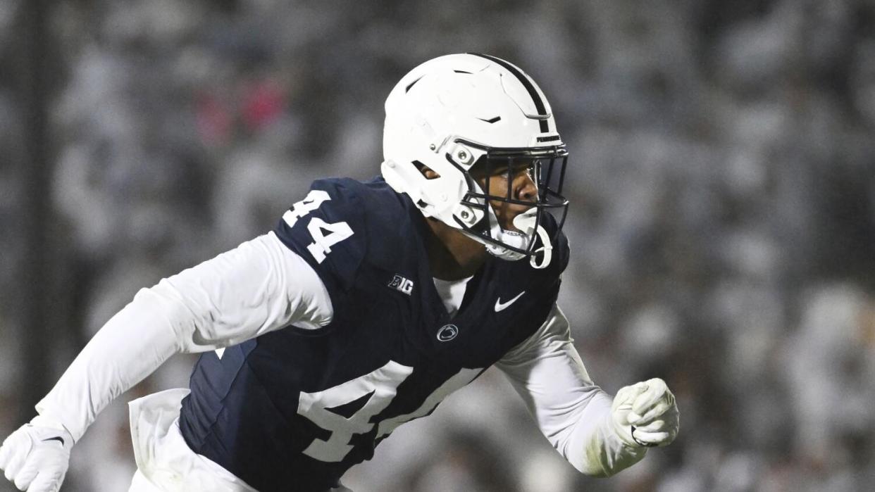 Penn State defensive end Chop Robinson rushes against Iowa.