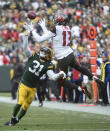 <p>Green Bay Packers cornerback Davon House (31) breaks up a pass intended for Tampa Bay Buccaneers wide receiver Mike Evans (13) in the second quarter at Lambeau Field. Mandatory Credit: Benny Sieu-USA TODAY Sports </p>