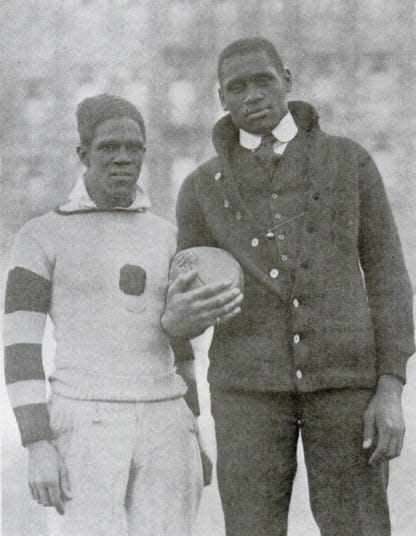 Fritz Pollard (left) poses with Paul Robeson, a singer, movie star, talented athlete and civil rights advocate.