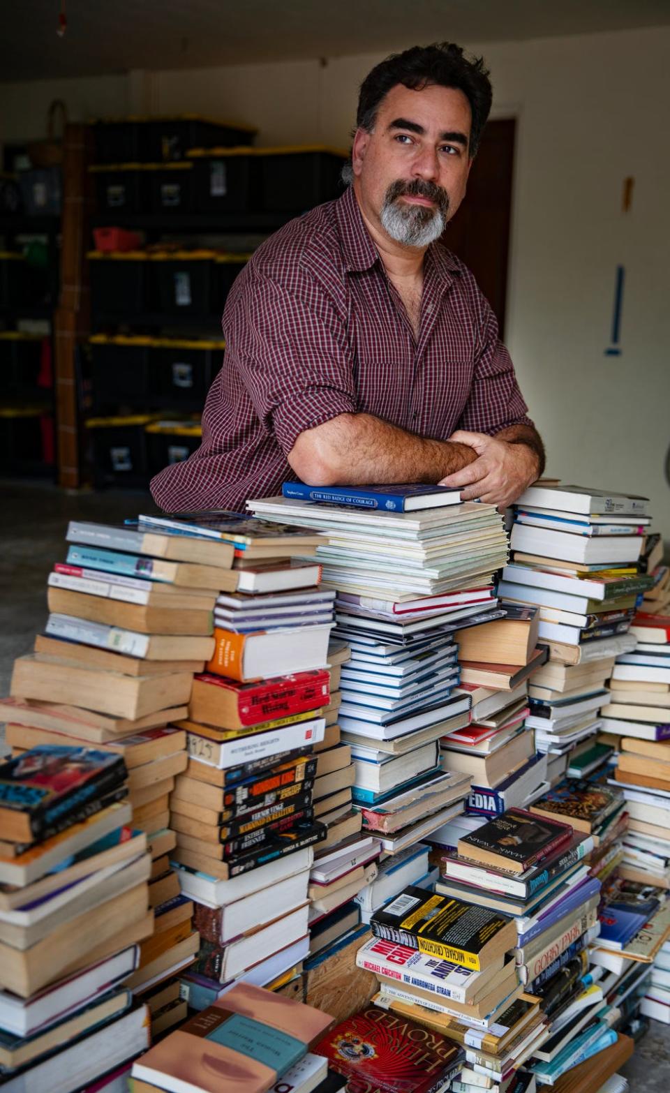 Michael Andoscia, a former teacher at North Fort Myers high school, resigned his position of 8 years after the school removed his in-class library consisting of over 700 books. He has most of the books currently stored in his garage at his Fort Myers home.