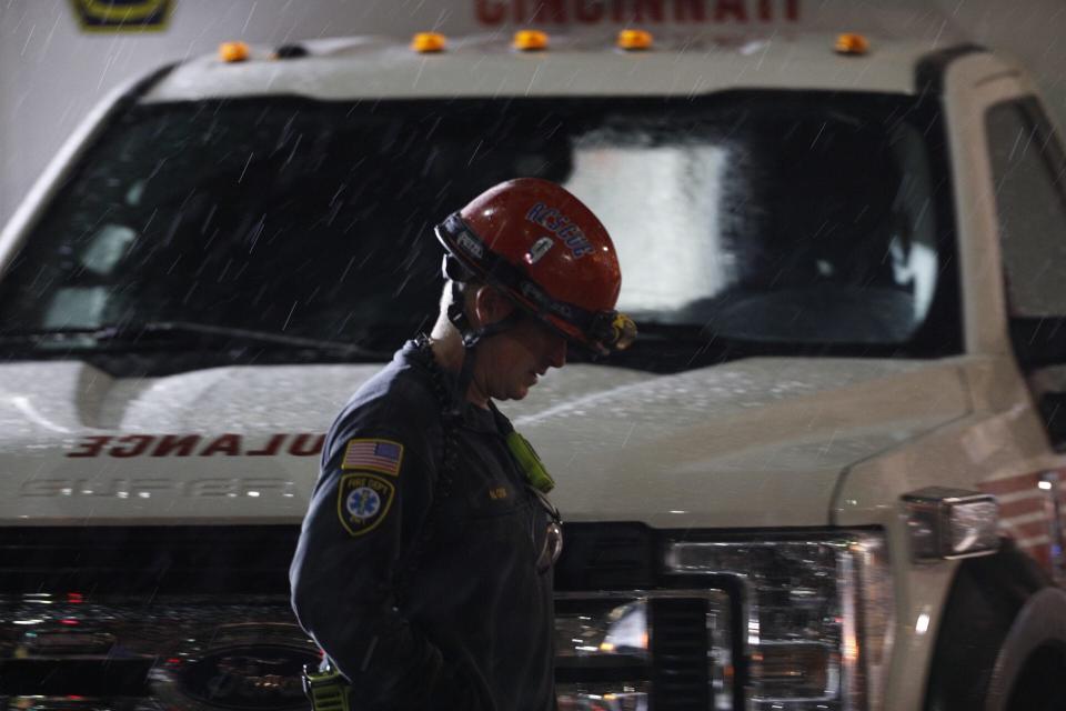 Crews continued to work through the night at W. 4th Street between Race and Elm in downtown Cincinnati on Tuesday, Nov. 26, 2019.