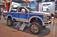 <p>In true SEMA style, this ambitious, beautifully painted, six-month custom build was finished just a week before the show. With a 1979 Bronco in mind, Precision All-Out Customs & Restorations in Springfield, Illinois, shortened a long-bed F-150 by 15 inches. The team installed a roll hoop and hard top over the rear occupants, as well as the ‘Bronchilla’ (cooler) and ‘Broncgrilla’ (butane travel grill).</p>